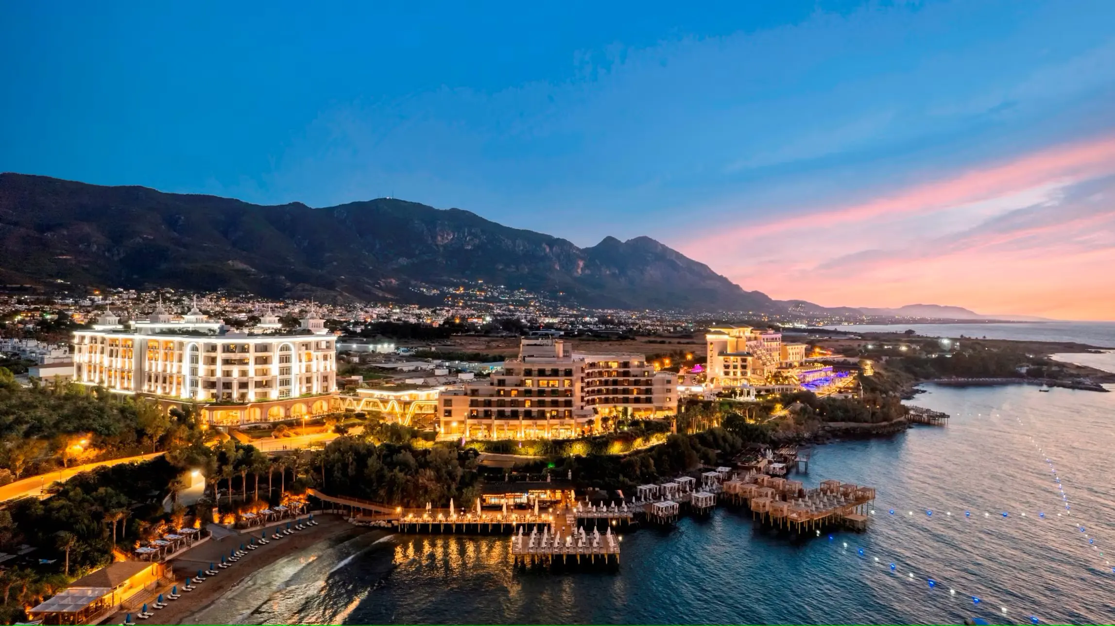 Luxury private taxi arriving at Merit Royal Diamond Hotel, a 5-star diamond-themed resort in Kyrenia, North Cyprus, featuring opulent architecture and a private marina