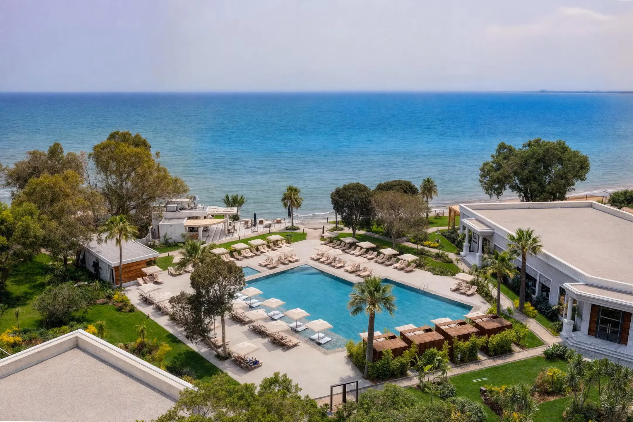 Luxury private taxi arriving at Merit Royal Gardens Hotel & Spa, a 5-star resort with lush gardens and private beach in Bafra, North Cyprus