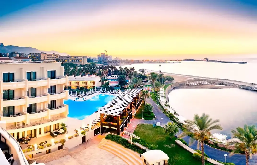 Private luxury taxi arriving at Vuni Palace Hotel, a sophisticated boutique hotel in Kyrenia, North Cyprus with sea views